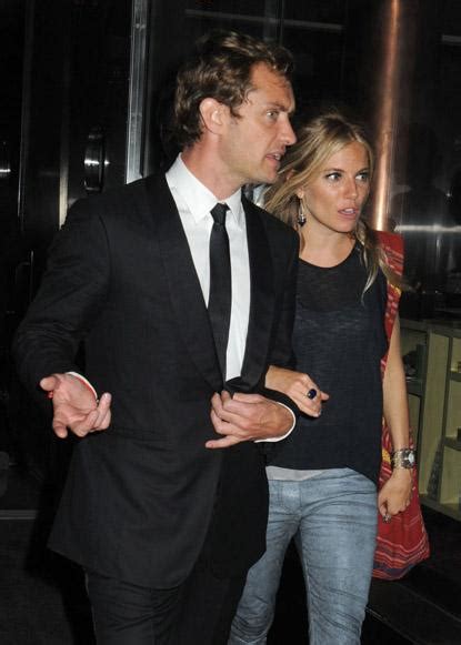 Jude Law and Sienna Miller Hold Hands