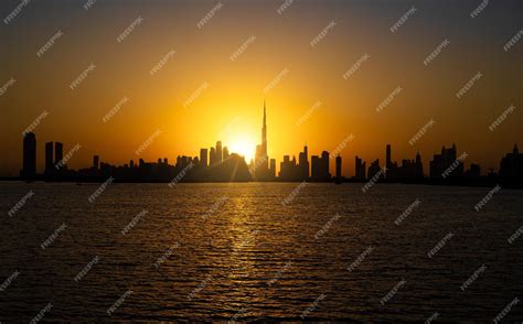 Premium Photo | Dubai skyline buildings during sunset. a shot of dubai skyscrapers a view from ...