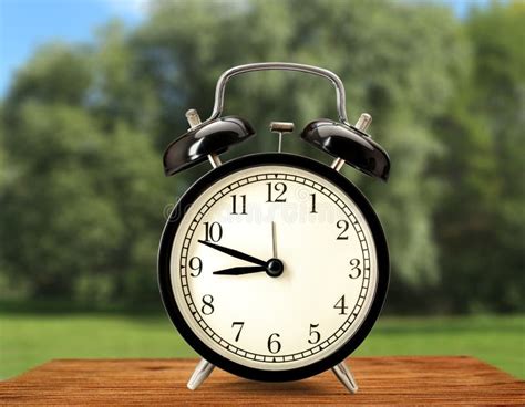 Old fashioned alarm clock stock image. Image of front - 74086491