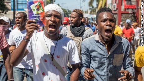 Protests in Haiti as political standoff continues - CNN