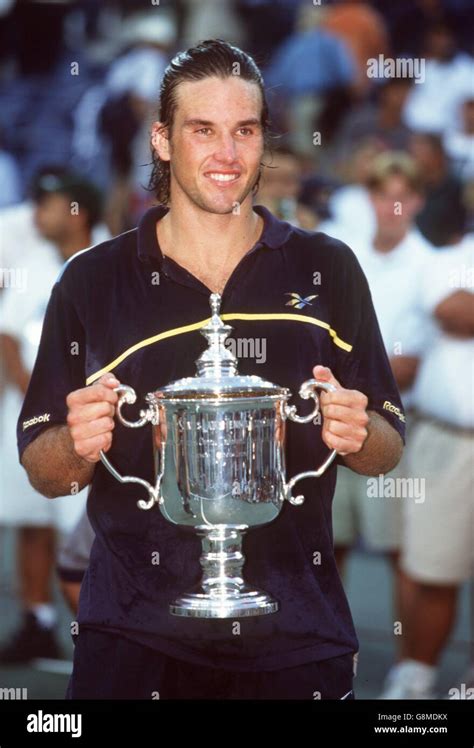 Patrick rafter celebrates with the us open trophy hi-res stock photography and images - Alamy