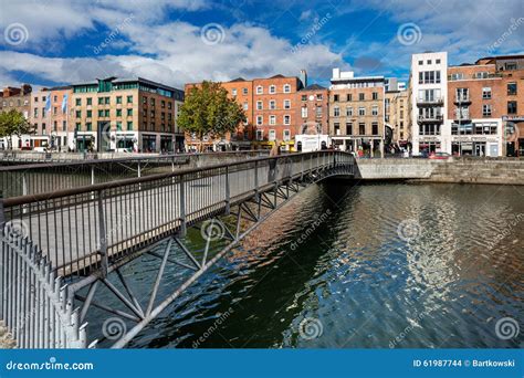 Millennium Bridge Is A Pedestrian Bridge Over The River Liffey In Dublin, Ireland Editorial ...