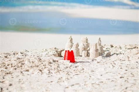 Bright kid toys on tropical sand beach 18036172 Stock Photo at Vecteezy