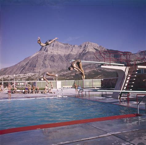 Three children diving into outdoor pool / Trois enfants pl… | Flickr