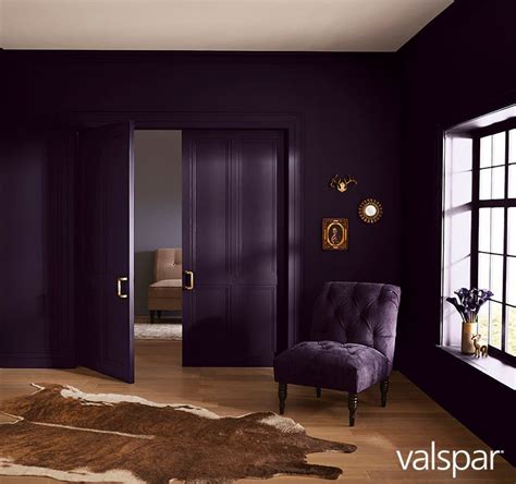 Decorative and quietly seductive, almost-black walls with a rich purple undertone create a r ...