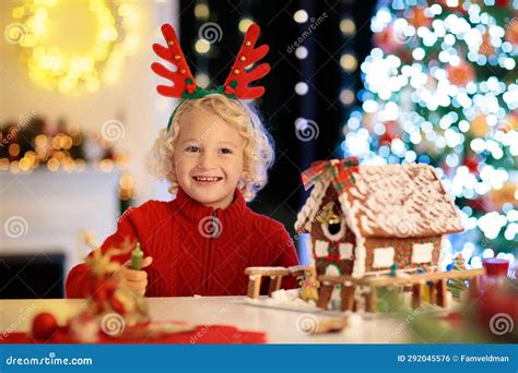 Kids Baking Gingerbread House. Christmas at Home Stock Photo - Image of cute, homemade: 292045576