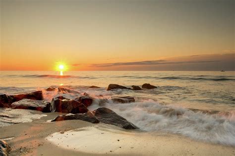 Sunrise over Belmar Beach NJ Photograph by Mark Cannizzaro - Fine Art America