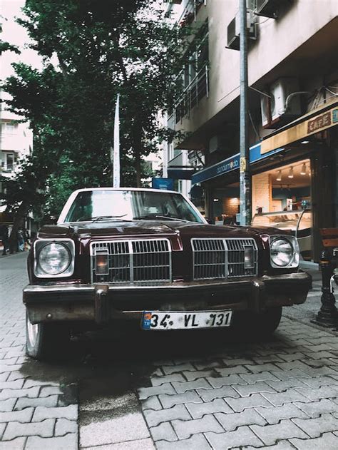 Vintage Car on Road · Free Stock Photo