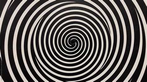 "Spinning Black And White Spiral Illusion" by Stocksy Contributor "Jeff Wasserman" - Stocksy