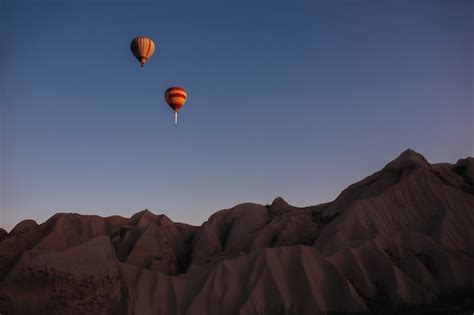 Premium Photo | Hot air balloon parade in cappadocia at sunrise