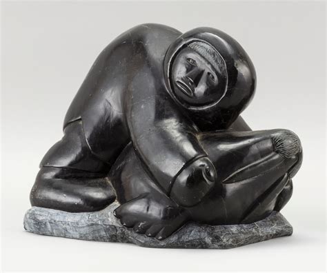 Sold Price: INUIT BLACK SOAPSTONE CARVING OF AN ESKIMO HUNTER WITH WALRUS Signed "Panusi" and ...