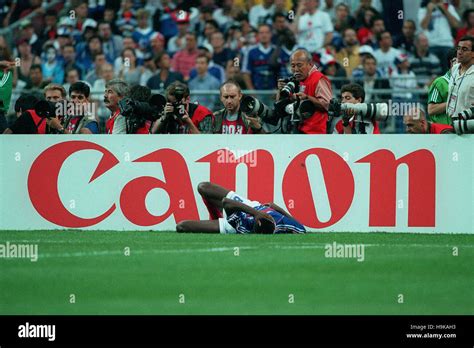 MARCEL DESAILLY (CANON ADVERT) BRAZIL V FRANCE 12 July 1998 Stock Photo ...