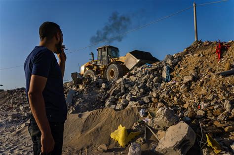 War reduced parts of Gaza to rubble. It's his job to take it away - Los ...