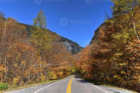 Road view of late fall foliage in Smugglers Notch, Vermont. 16174286 ...