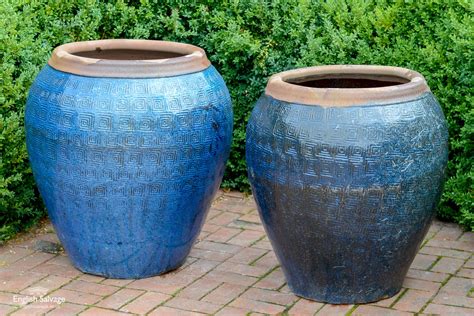 Blue glazed terracotta pots with Greek key