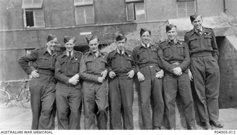 Group portrait of a flight crew of 467 Squadron RAAF. Identified, from left to right: 421483 Flt ...