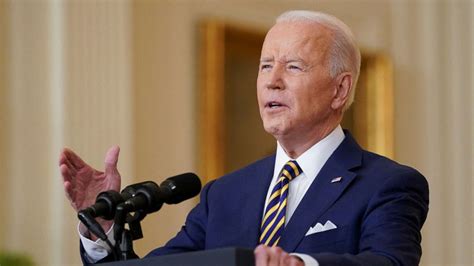 Biden defensive in rare solo news conference ahead of 1-year mark in ...