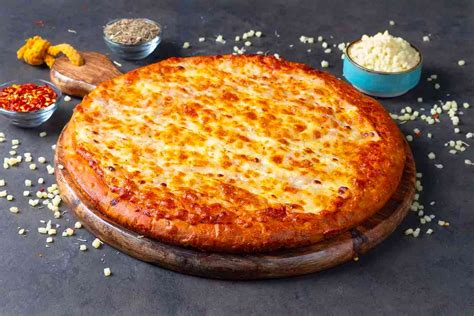 Order Double Cheese Margherita Cheese Burst Pizza Medium from Ovenstory on EatSure