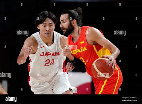 Spain's Ricky Rubio (9) drives on Japan's Daiki Tanaka (24) during a ...