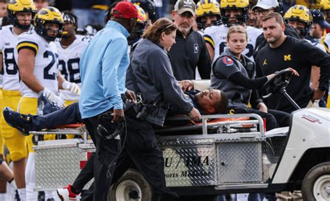 Michigan RB Coach Mike Hart Carted off Field After Collapsing on the ...