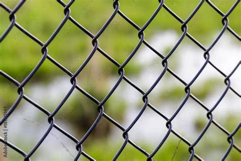 cyclone fence texture background Stock Photo | Adobe Stock