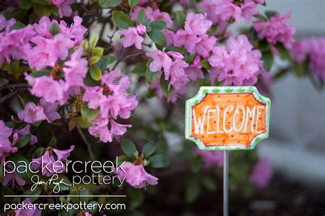 This "Welcome" garden sign stands approximately 14.5" in height and would add a nice splash of ...