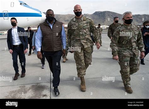 Secretary of Defense Lloyd J. Austin III walks with the commander of Combined Security ...