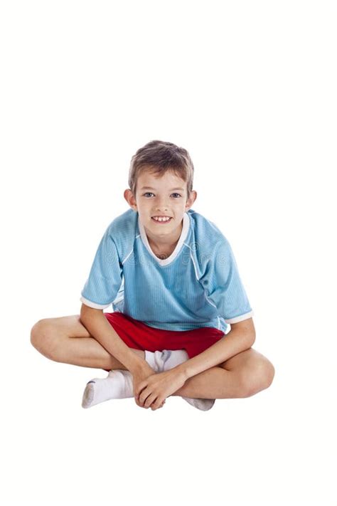 Boy sitting cross-legged stock image. Image of grinning - 2112737