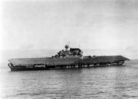 “Battle of Midway, June 1942. USS Yorktown (CV-5) lists heavily after she was abandoned during ...