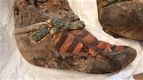 Ancient mummy 'with 1,100 year old Adidas boots' died after she was struck on the head