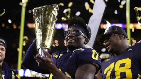 Michigan beats Washington to win CFP national championship