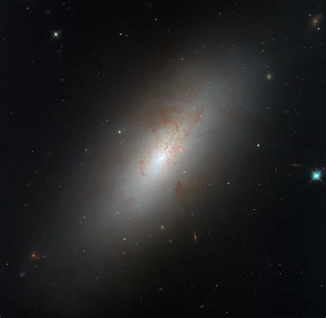 Hubble Observes a Peculiar Galaxy Shape - NASA Science