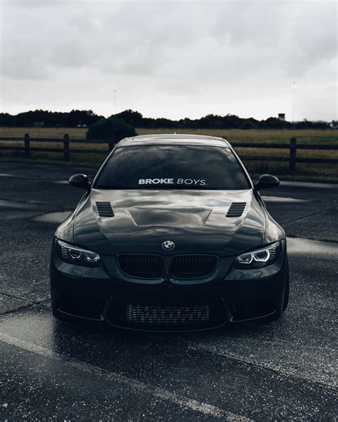 Download Black Bmw M3 Parked Wallpaper | Wallpapers.com