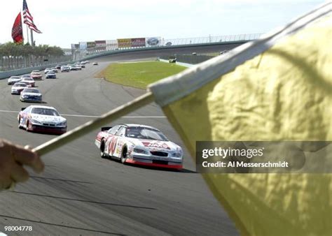 Car Racing Caution Flag Photos and Premium High Res Pictures - Getty Images