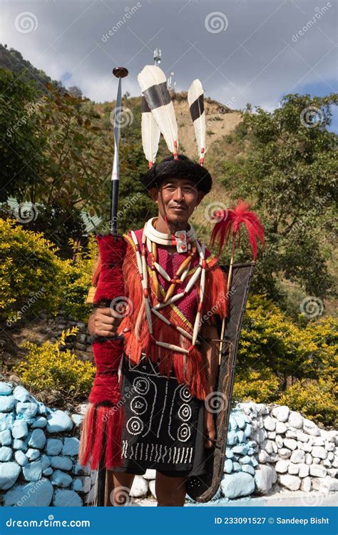 A Naga Tribesman Dressed in Traditional Attire with Traditional Weapons Editorial Photography ...