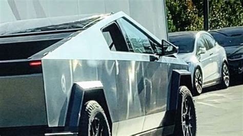 Slick Tesla Cybertruck prototype spotted with new experimental side mirror design on futuristic ...