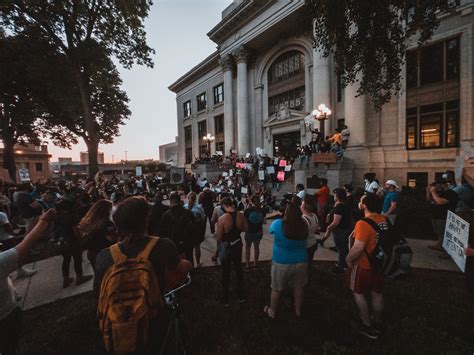 Protesters Gathered in front of a Building · Free Stock Photo