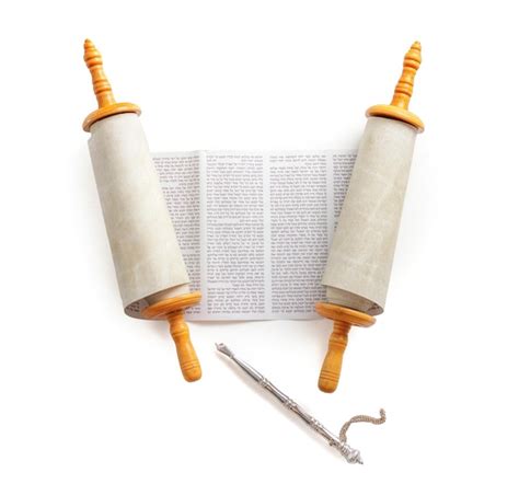 Premium Photo | Torah scroll with a pointer on a light background