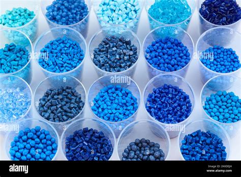 different blue plastic resin granulates for injection moulding process in different granulate ...