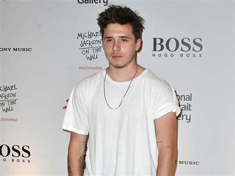 Brooklyn Beckham hints he's broody after being spotted with new girl