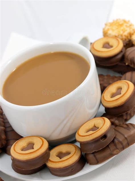 Coffee with Chocolate Biscuits Stock Image - Image of cafe, milk: 12163907