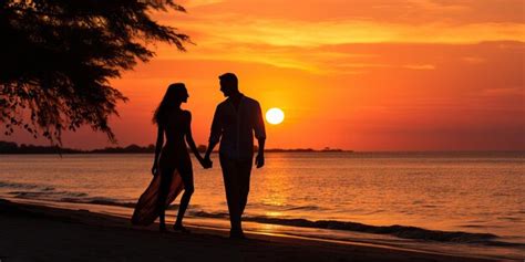 Premium AI Image | Silhouette of a romantic couple on the beach at sunset