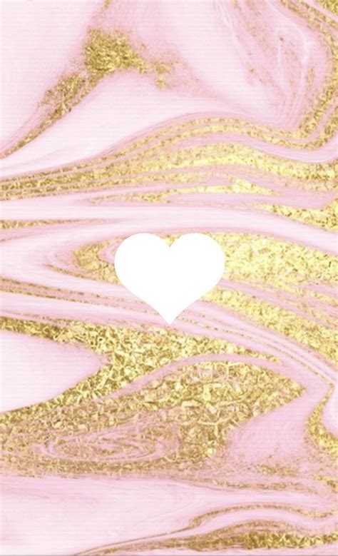 a pink and gold background with a white heart