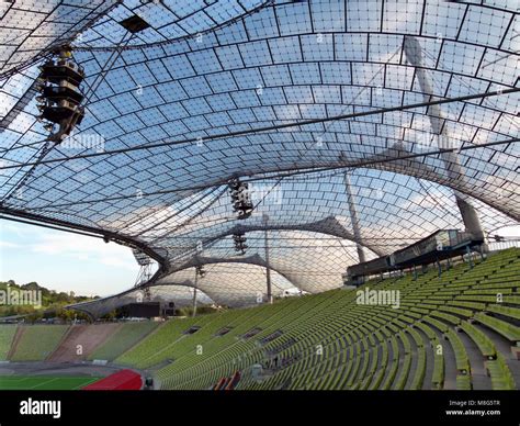 The famous roof of the Munich Olympic stadium designed by Behnisch and Frei Otto Stock Photo - Alamy