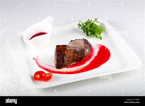 Rib-eye steak with sauce Stock Photo - Alamy