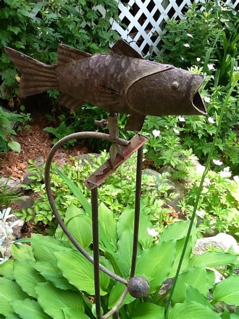 Fish in the garden! LOVE this. | Fish art, Wall sculpture art, Garden art