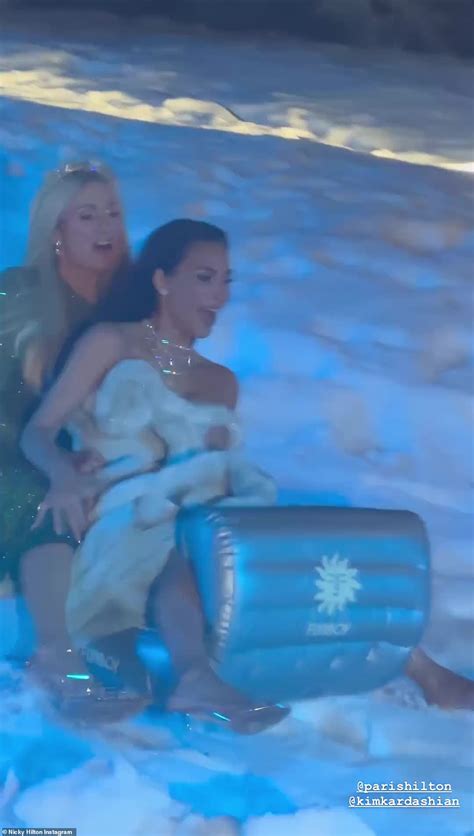 Kim Kardashian and Paris Hilton sled in artificial snow at the ...