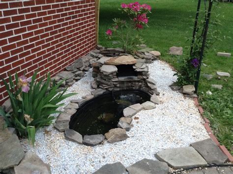 Small fish pond with pebbles and stones and waterfall. | Small backyard ponds, Ponds backyard ...