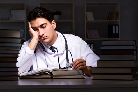 The Medical Student Preparing for University Exams at Night Stock Photo - Image of graduate ...