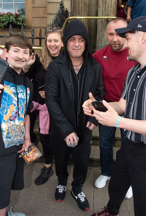 Fans swarm Green Day as rockers leave swanky Glasgow hotel after Bellahouston gig | The Scottish Sun